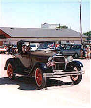 Grandad and Jenna in the Model A